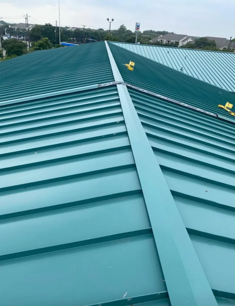 Green commercial metal roof ridge and valley for Metal Roof Repair in Victoria